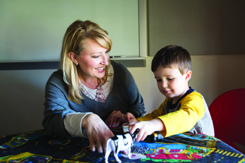 Graduate student Sara Nosovitch works with Willam Barford.