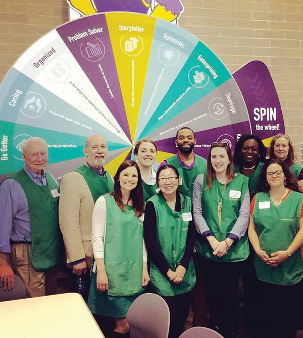 Faculty and staff volunteer with Junior Achivement.