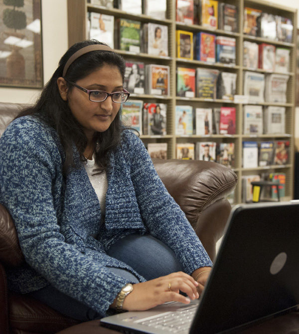 Fontbonne student studying on her laptop