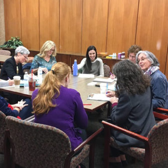 Dr. Susan Lenihan works with Fontbonne graduate students.