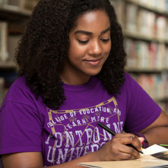 Student studying in the library.