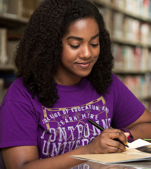 Student studying in the library.
