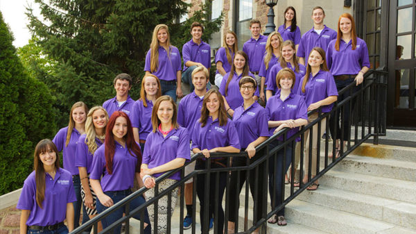 Student Ambassadors standing together outside.