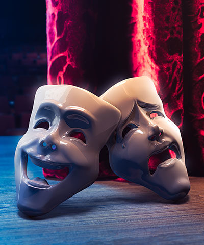 Theater masks on a stage.