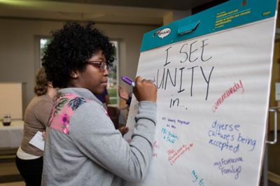 Female student at unity event.