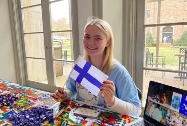 Anna laine holding Finland's flag