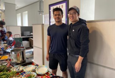 Vietnamese students serving pho